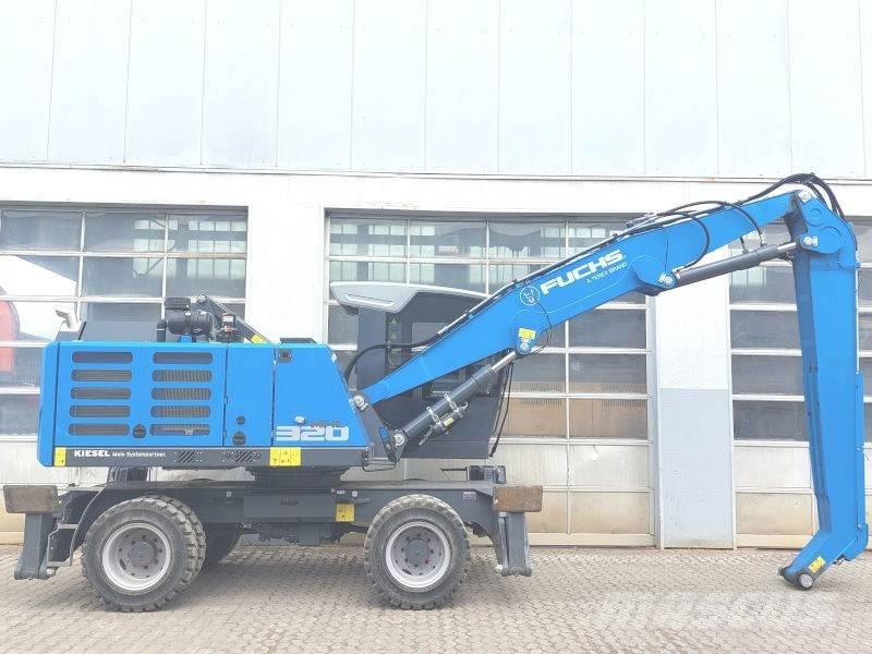 Fuchs MHL 320 F Paleta de manipulare