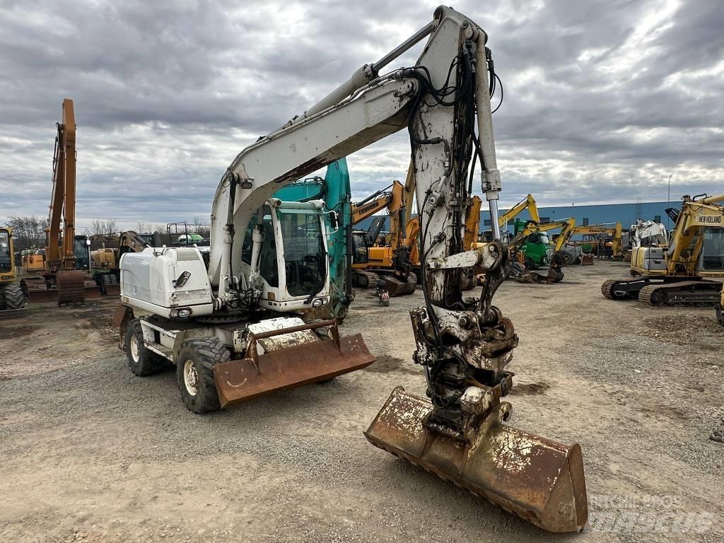 CAT M 316 D Excavatoare cu roti