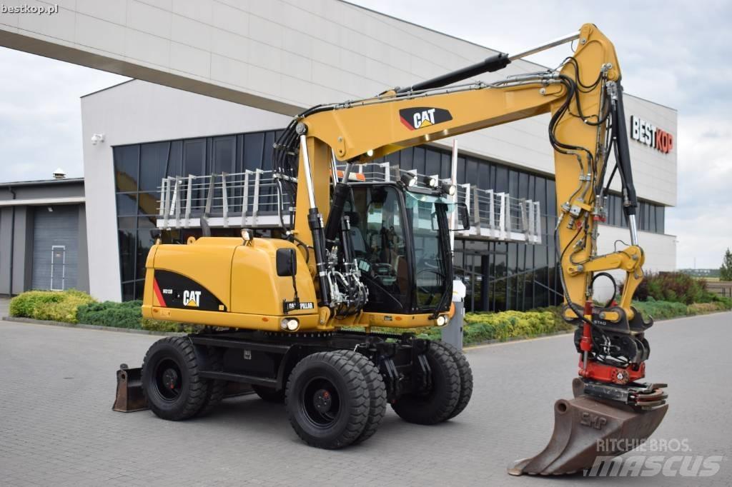 CAT M 313 D Excavatoare cu roti