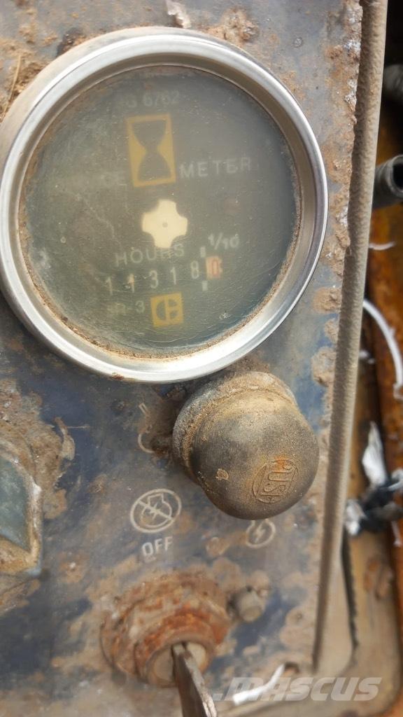 CAT 953 Încarcatoare cu excavator