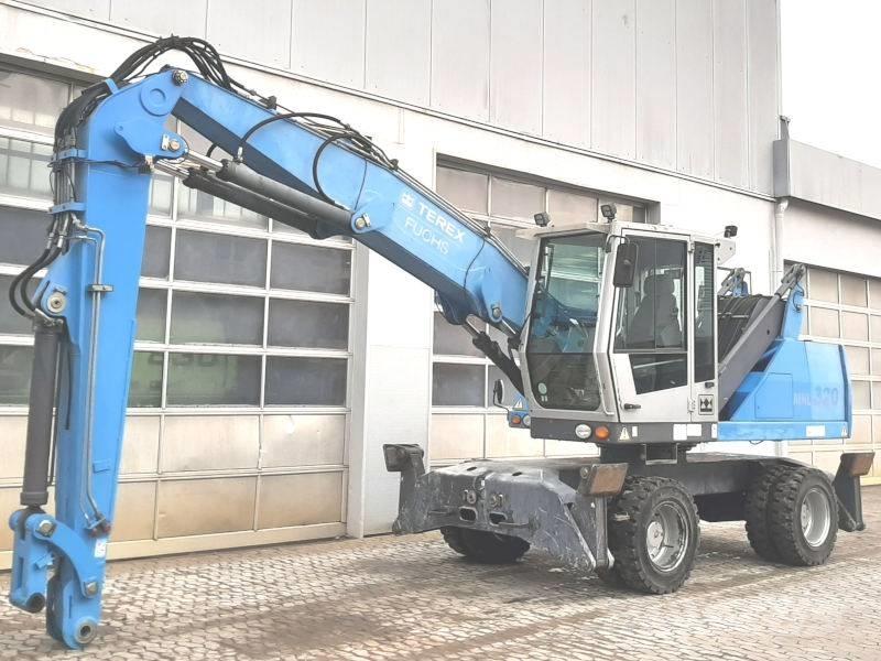 Fuchs MHL 320 D Paleta de manipulare