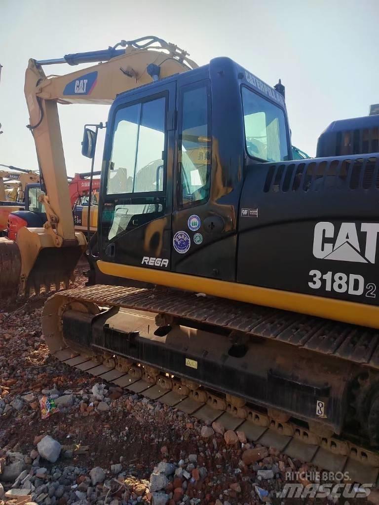 CAT 318 Excavatoare pe șenile
