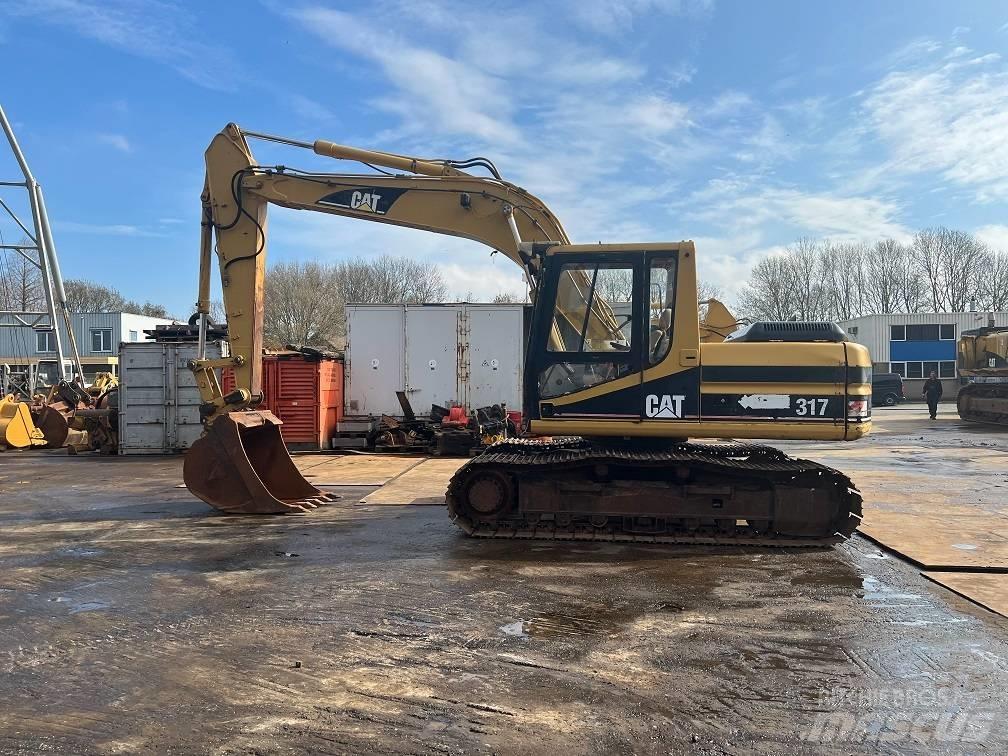 CAT 317 Excavatoare pe șenile
