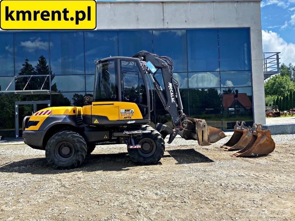 Mecalac 12 M TX Buldoexcavatoare