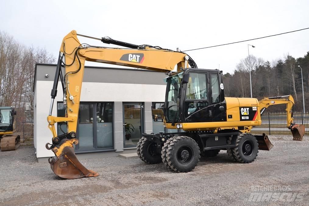 CAT M 315 D Excavatoare cu roti