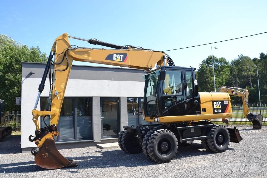 CAT M 315 D Excavatoare cu roti