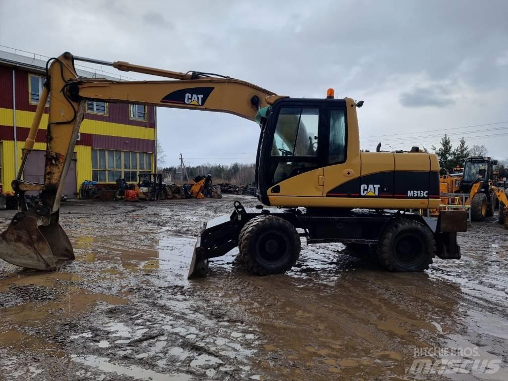 CAT M 313 C Excavatoare cu roti