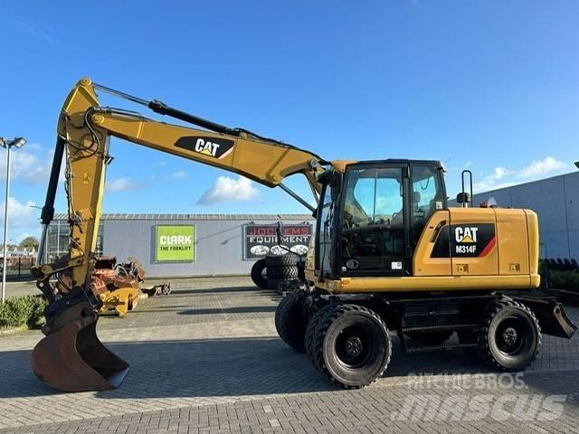 CAT M 314 F Excavatoare cu roti