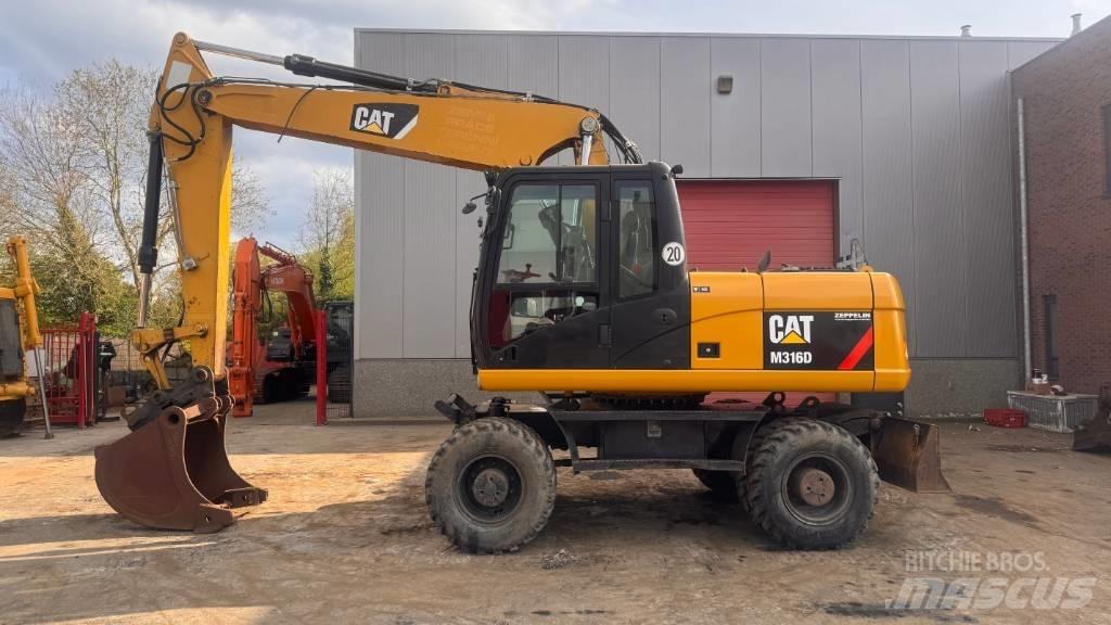 CAT M 316 D Excavatoare cu roti