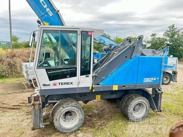Fuchs MHL 320 Paleta de manipulare
