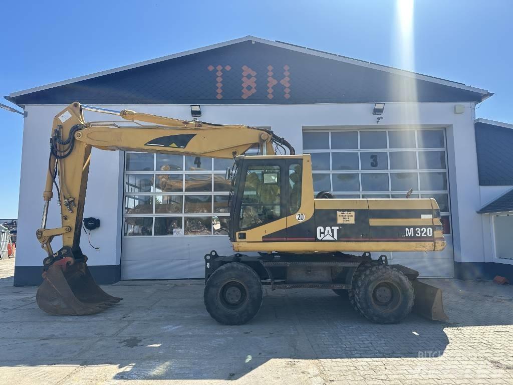 CAT M 320 VAH Excavatoare cu roti
