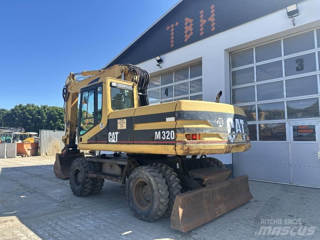 CAT M 320 VAH Excavatoare cu roti