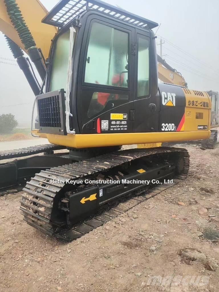 CAT 323 Excavatoare pe șenile

