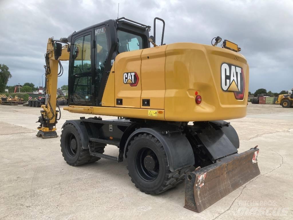 CAT M314 Excavatoare cu roti