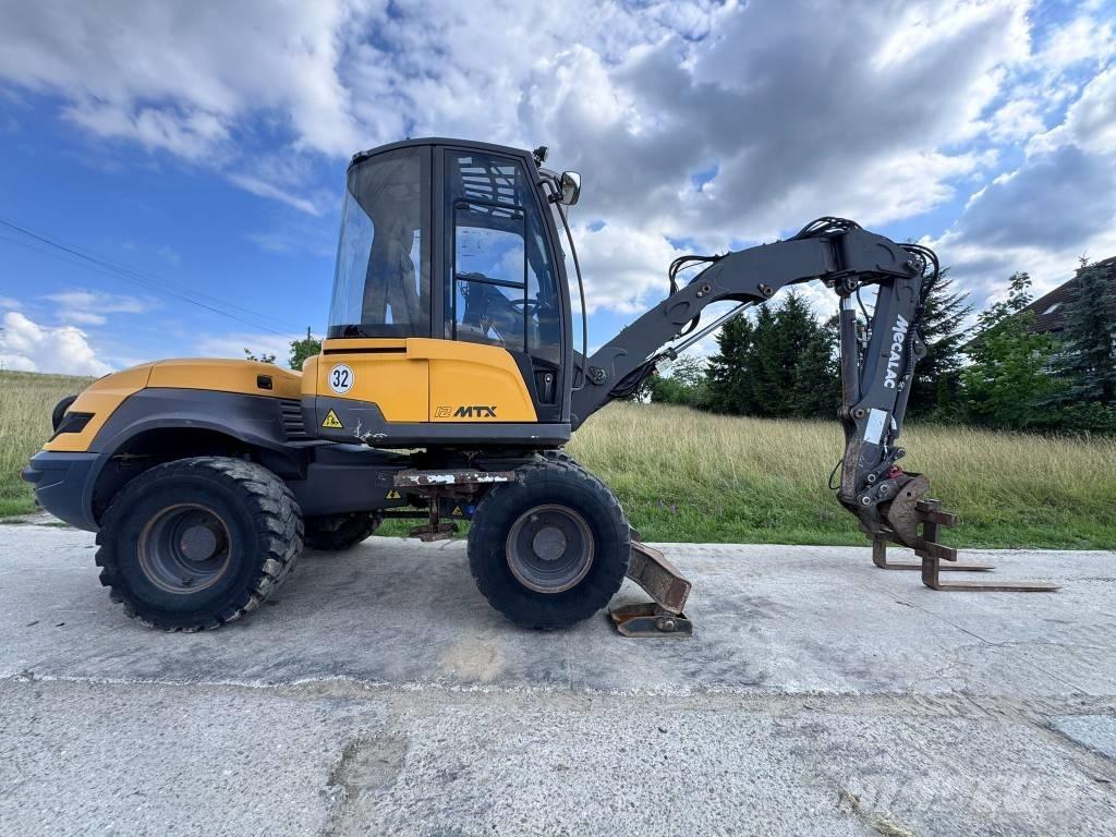 Mecalac 12 MTX Buldoexcavatoare