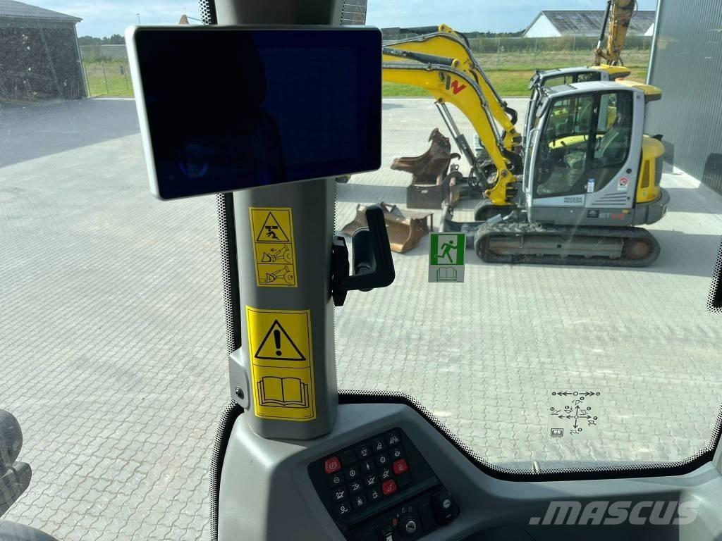 CASE 521 Incarcator pe pneuri