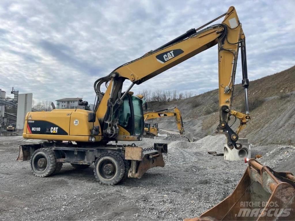 CAT M318D Excavatoare cu roti
