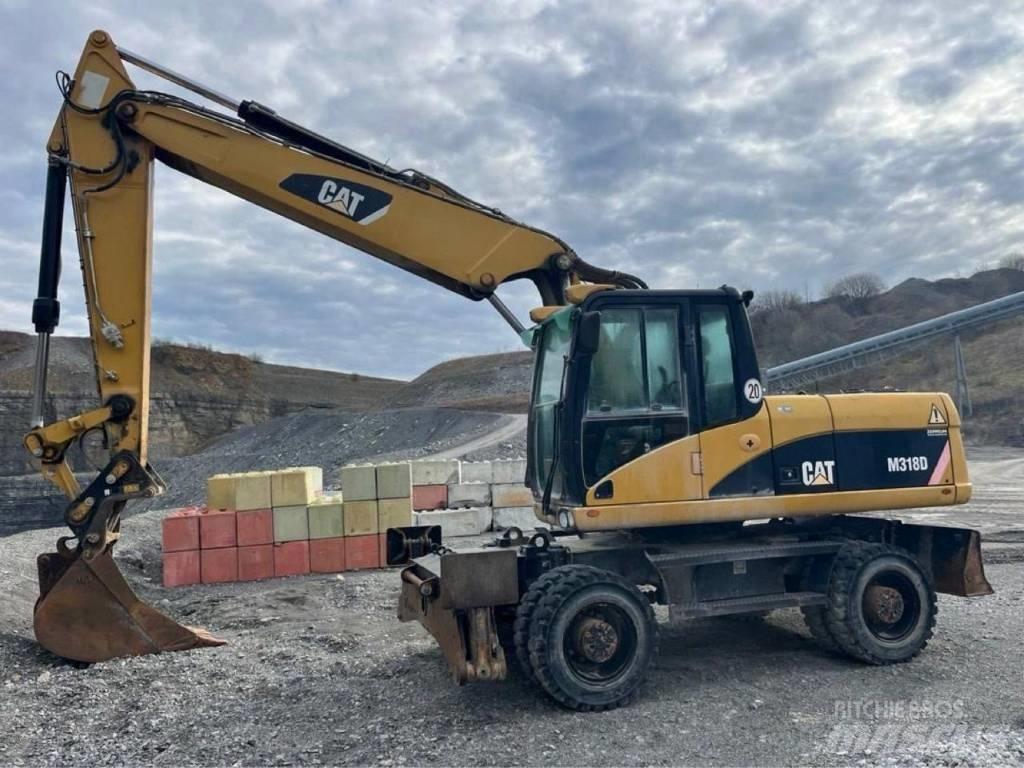 CAT M318D Excavatoare cu roti