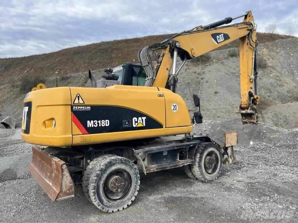 CAT M318D Excavatoare cu roti
