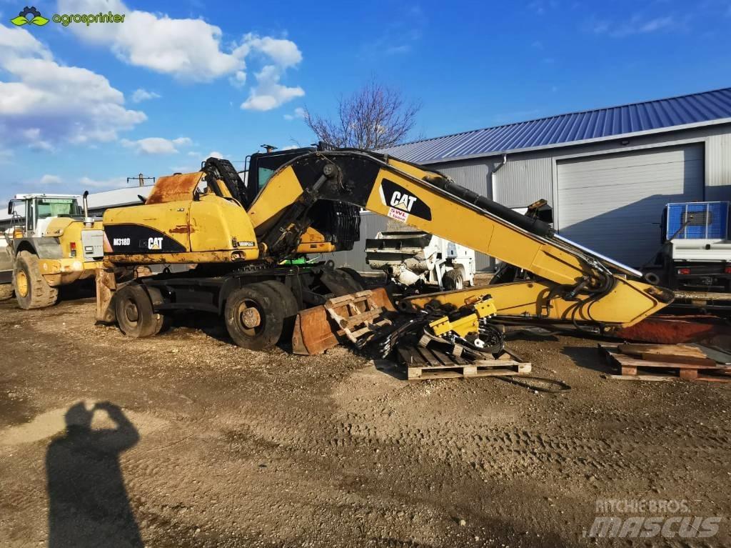 CAT M 318 D Paleta de manipulare