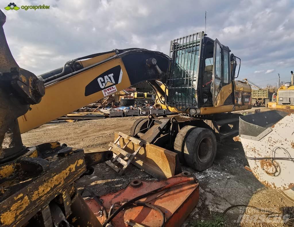 CAT M 318 D Paleta de manipulare