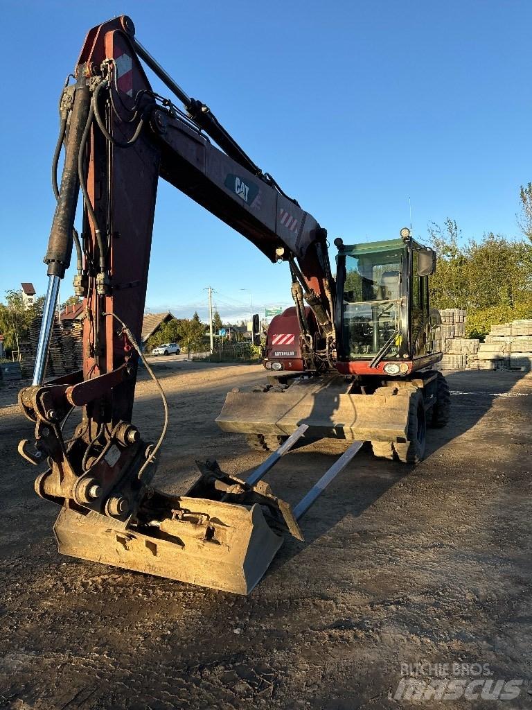 CAT 313 D Excavatoare cu roti