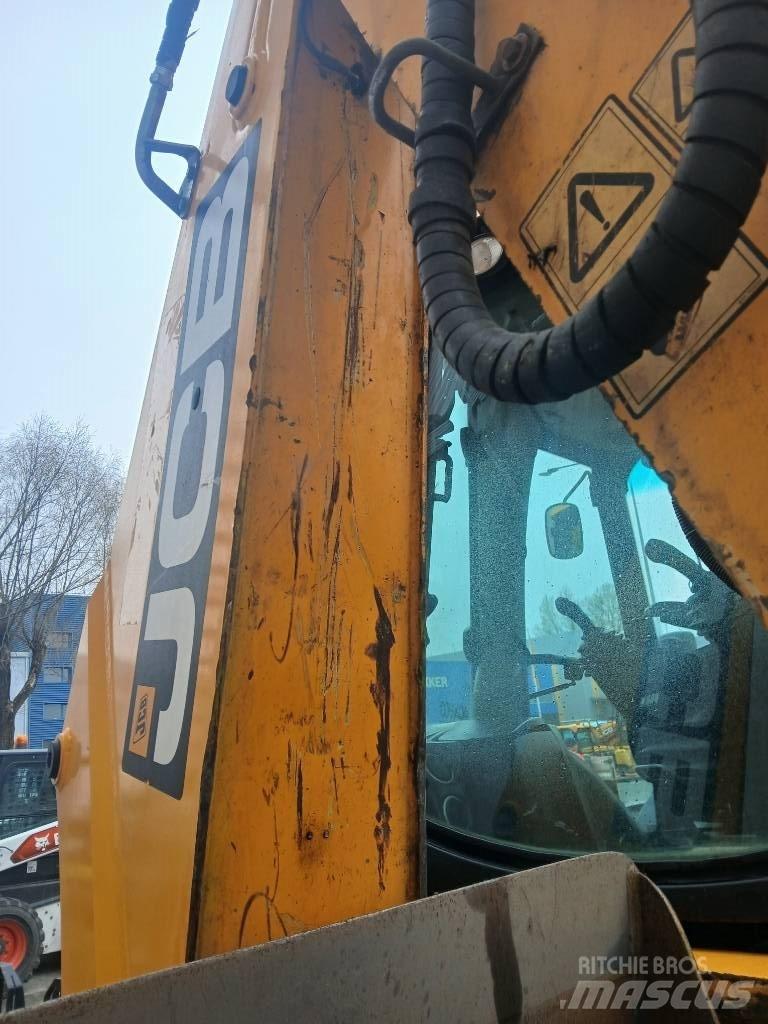 JCB 4cxAEC joystick Buldoexcavatoare