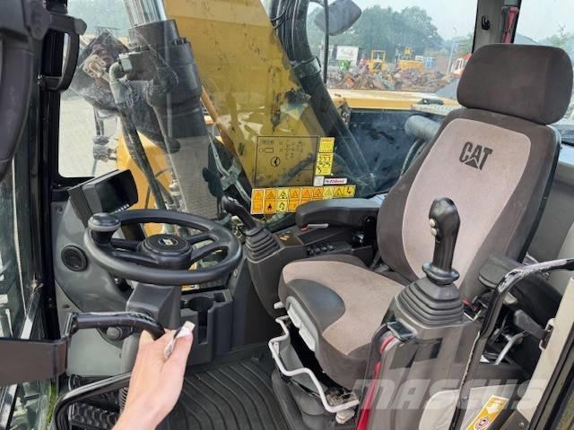 CAT M 320 F Excavatoare cu roti