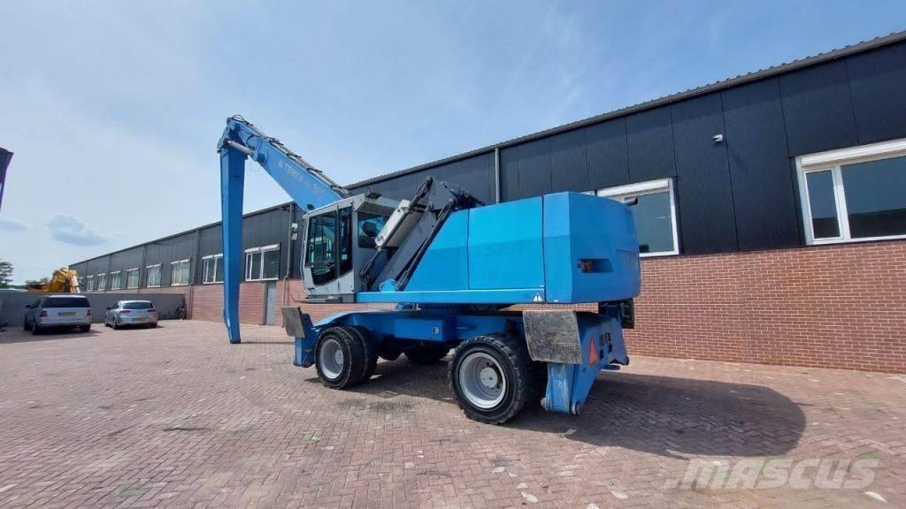 Fuchs MHL360 Paleta de manipulare