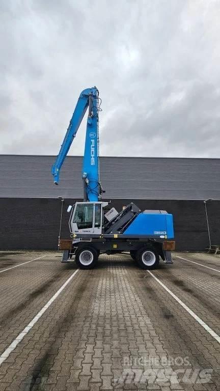 Fuchs MHL360 Paleta de manipulare