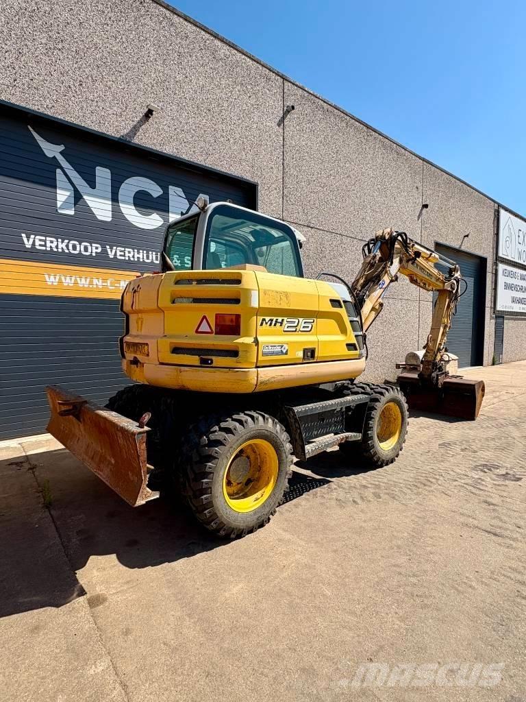 New Holland MH 2.6 Excavatoare cu roti