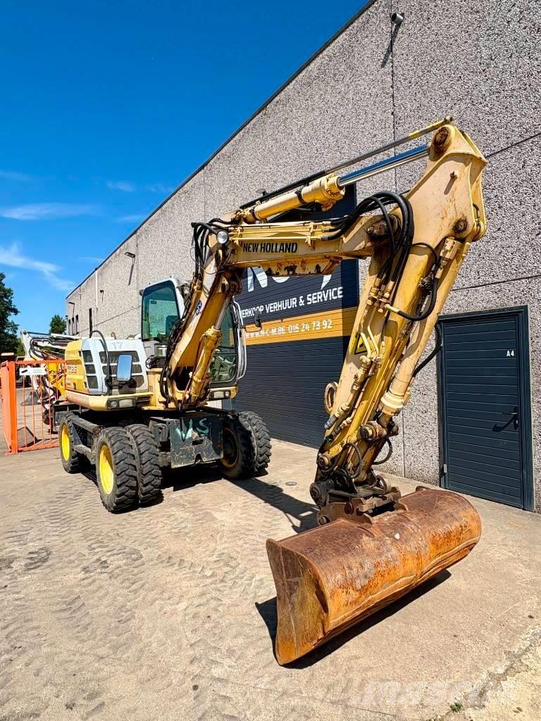 New Holland MH 2.6 Excavatoare cu roti