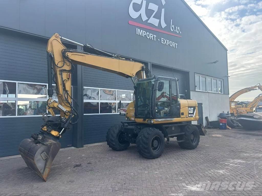 CAT M313D Excavatoare cu roti