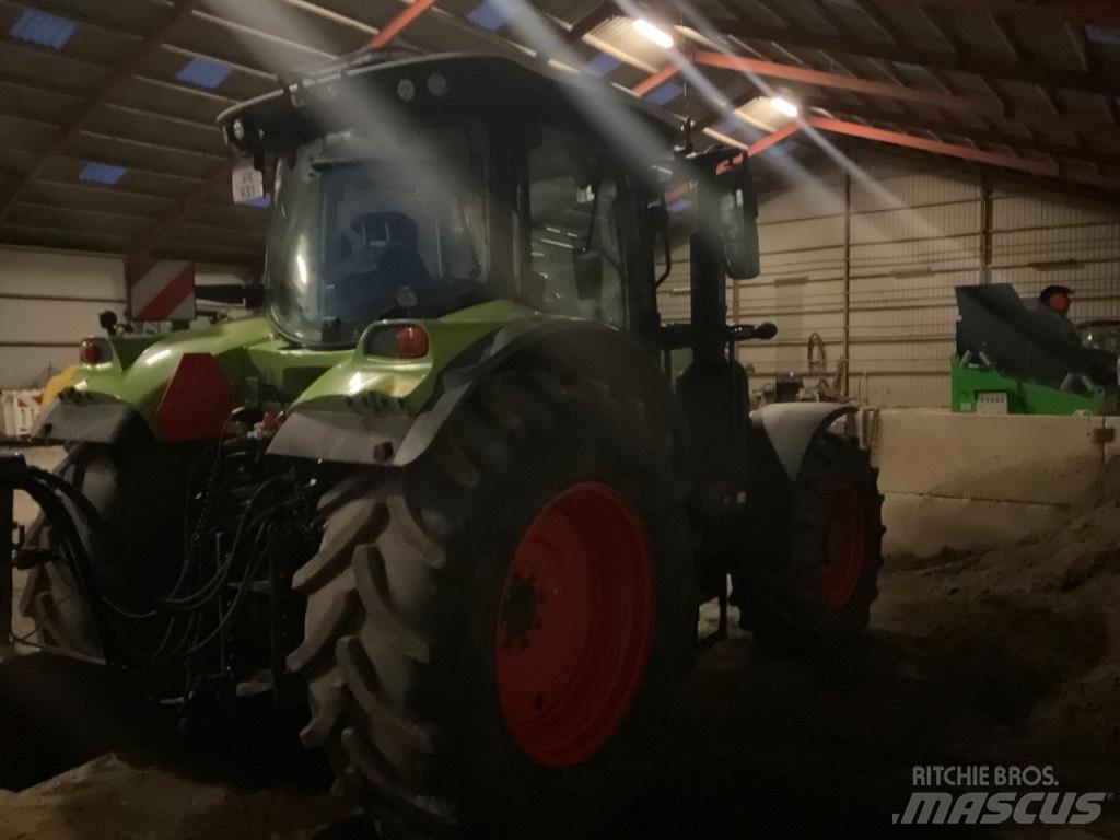 CLAAS ARION 650 cis + Tractoare