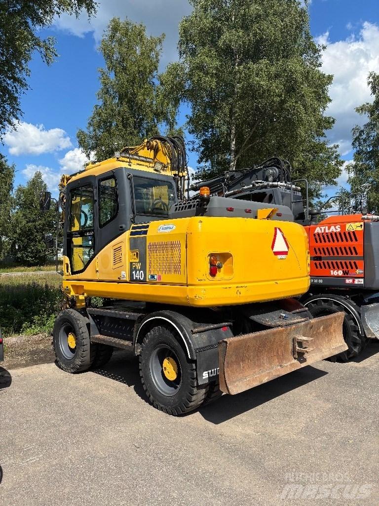 Komatsu PW 140-7 Excavatoare cu roti