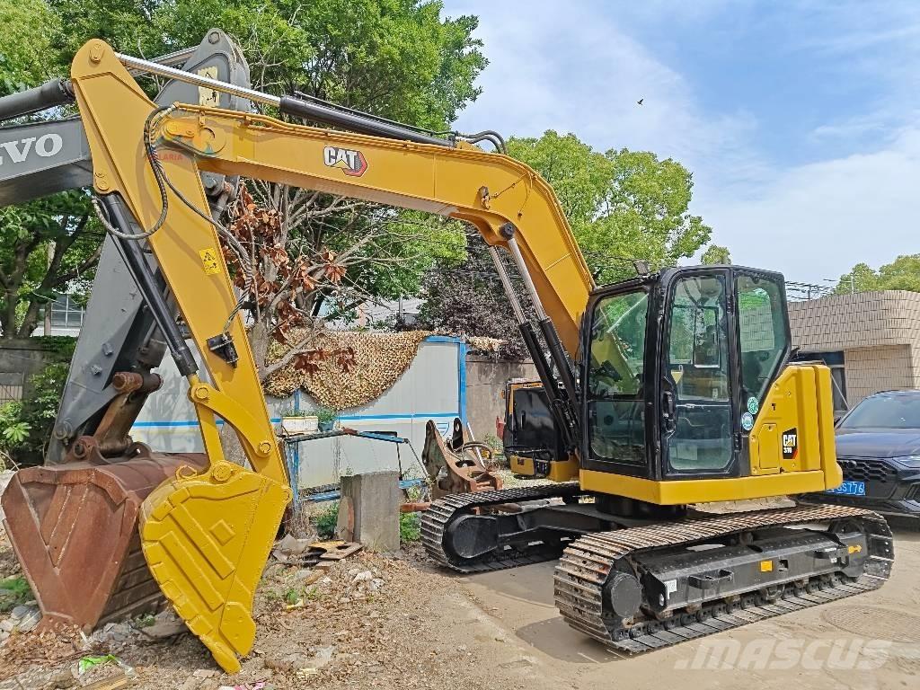 CAT 310 Excavatoare pe șenile
