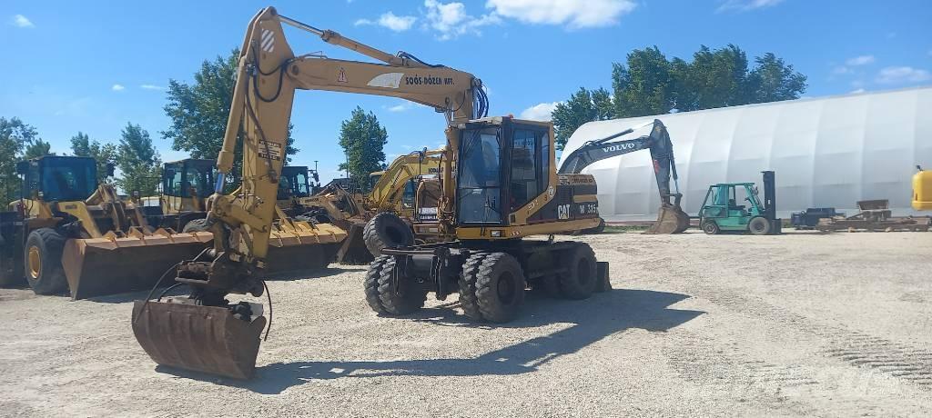 CAT M 315 Excavatoare cu roti