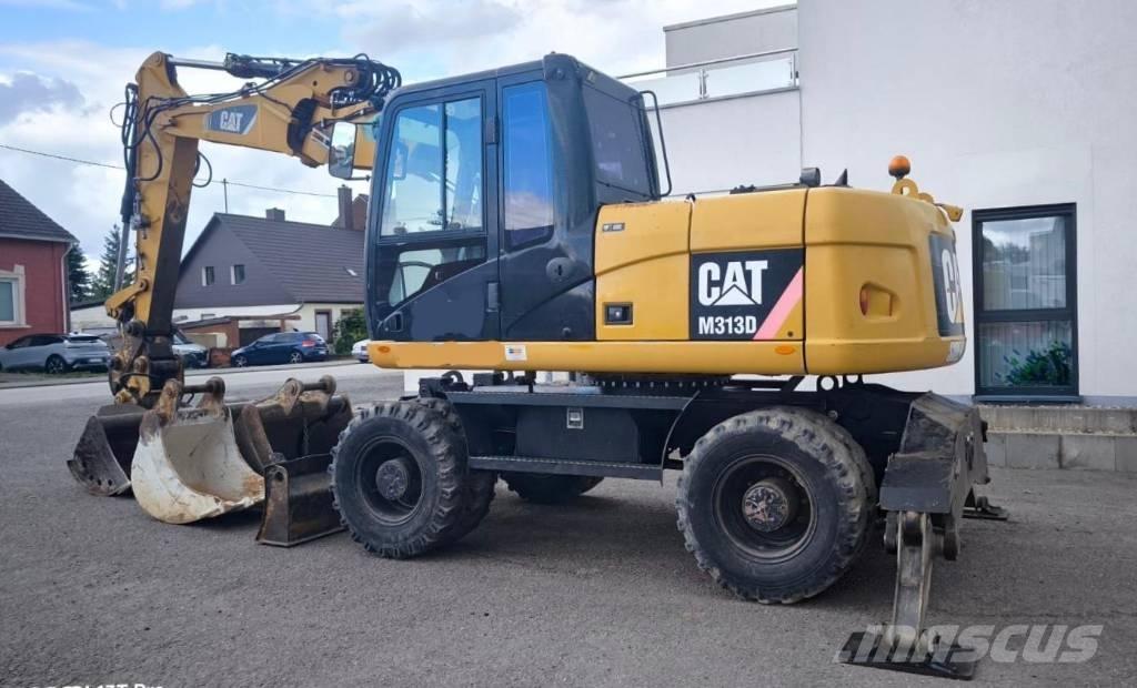 CAT M 313 D Excavatoare cu roti