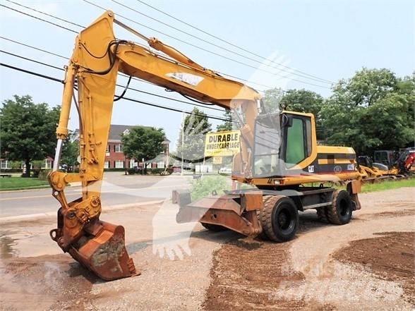 CAT M320 Excavatoare cu roti