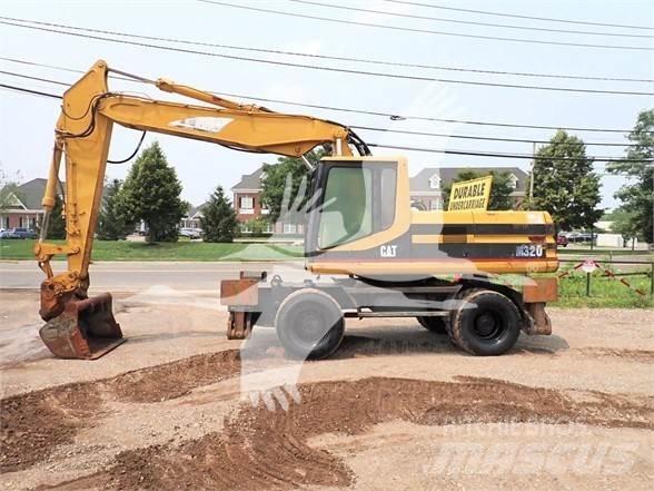 CAT M320 Excavatoare cu roti