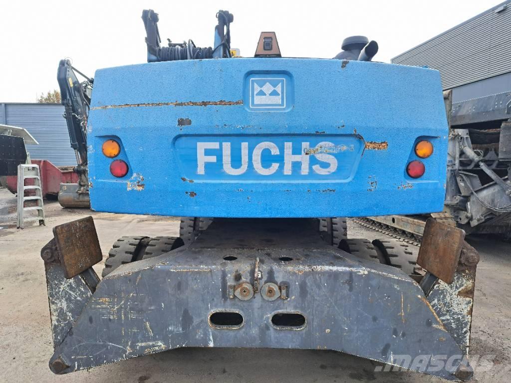Fuchs MHL 335 Paleta de manipulare