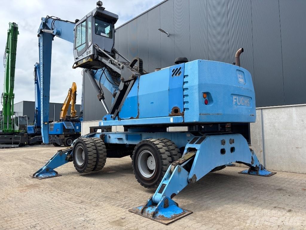 Fuchs MHL 380 Paleta de manipulare