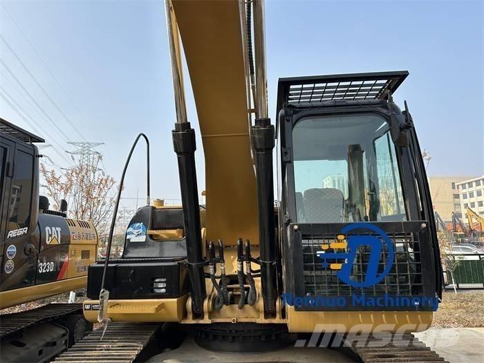 CAT 323D/323/323DL Excavatoare pe șenile
