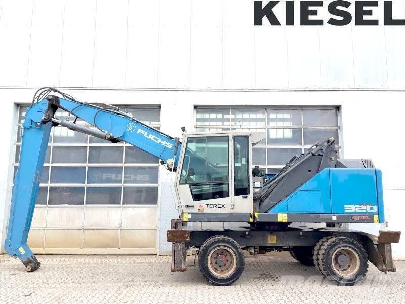 Fuchs MHL 320 F Paleta de manipulare