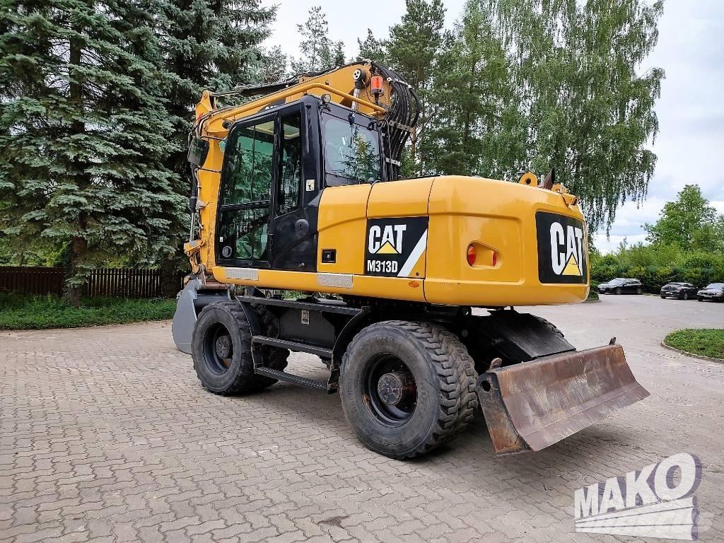 CAT M 313 D Excavatoare cu roti