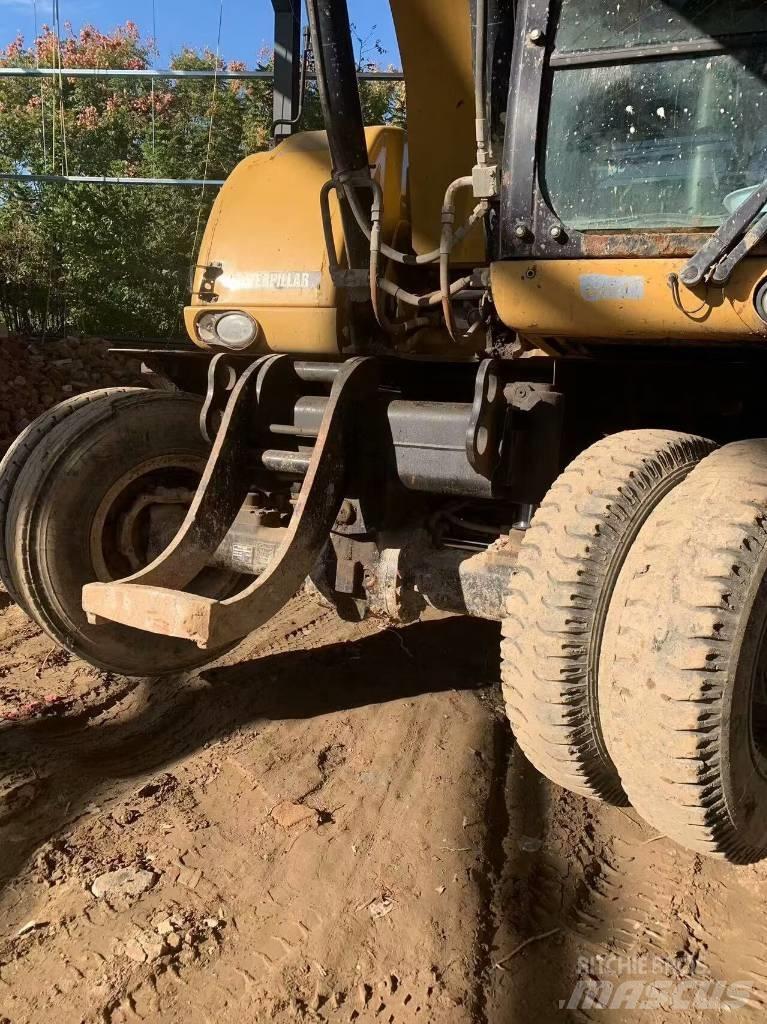 CAT 315 D Excavatoare cu roti