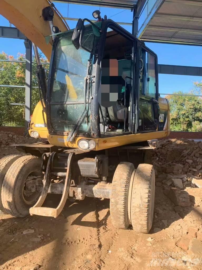 CAT 315 D Excavatoare cu roti