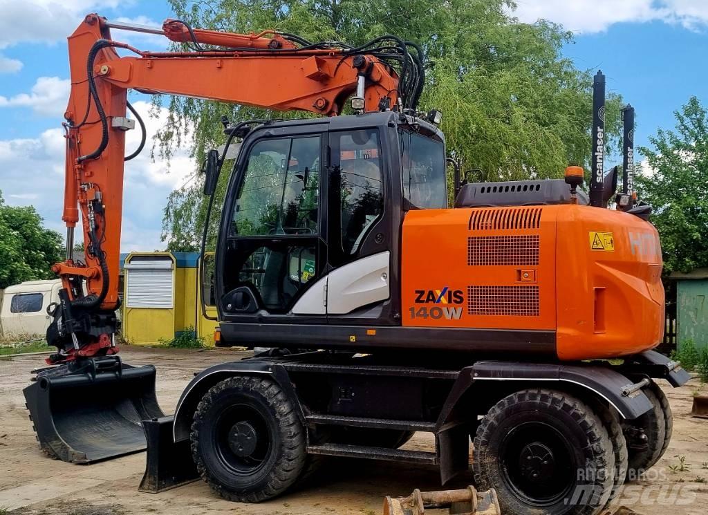 Hitachi 140W Excavatoare cu roti