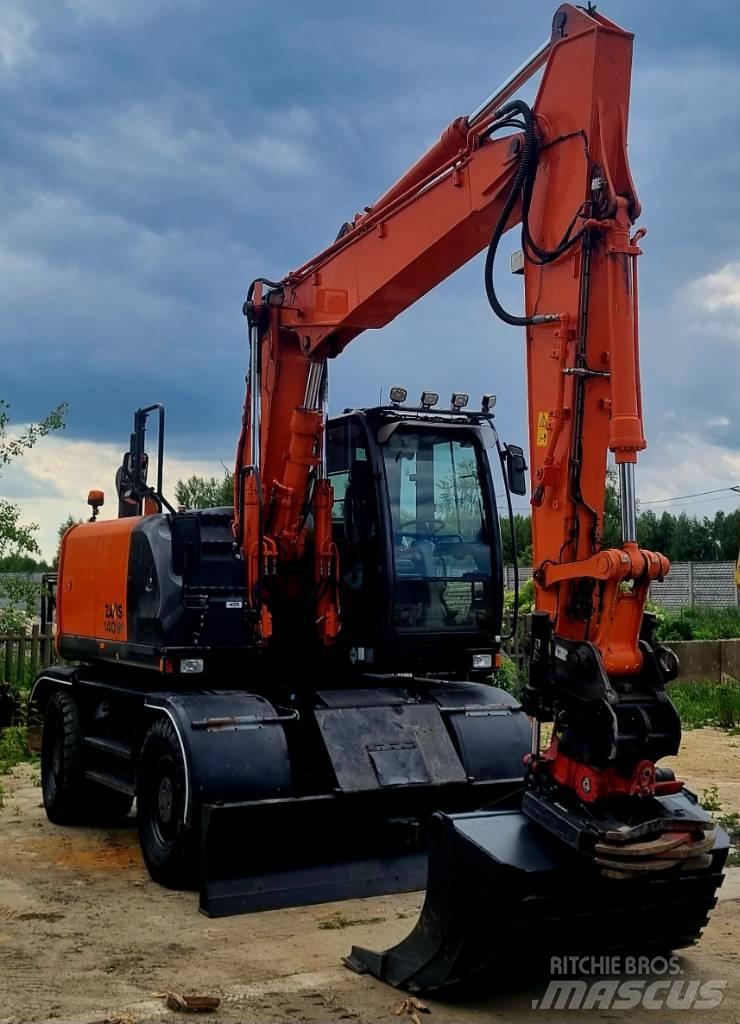 Hitachi 140W Excavatoare cu roti