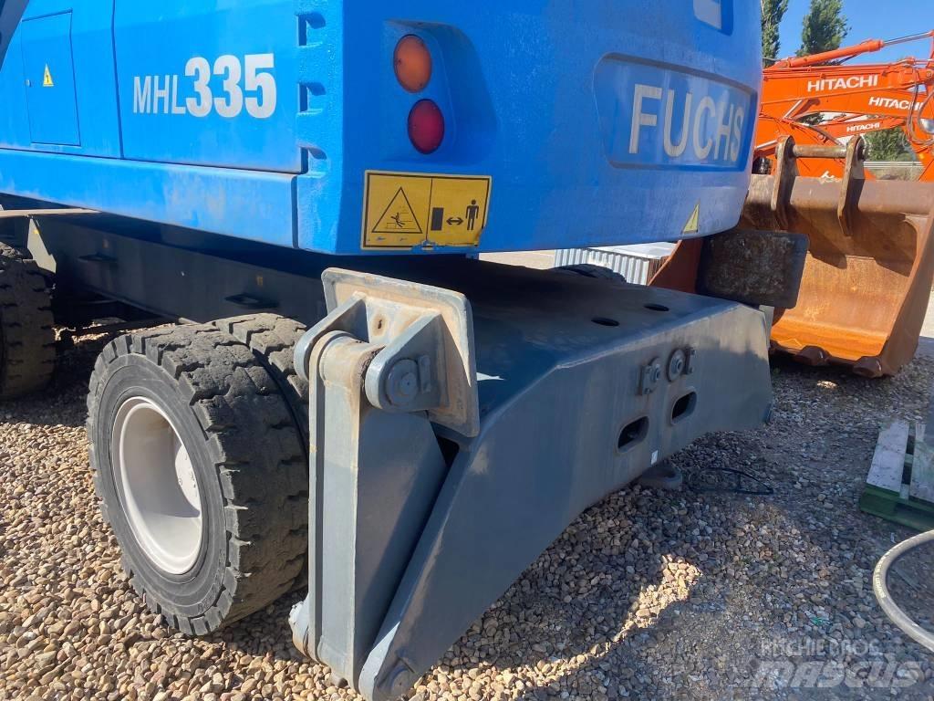 Fuchs MHL 335 Paleta de manipulare